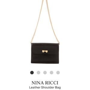 Nina Ricci black leather purse (authentic)